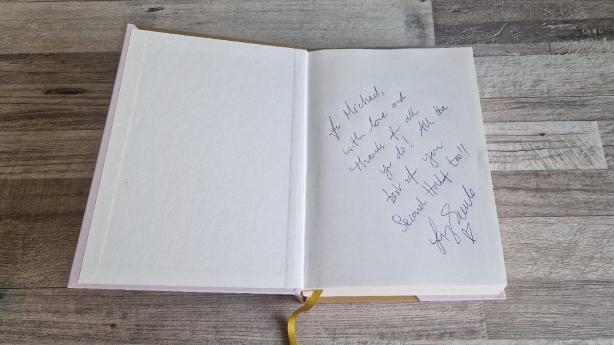 A handwritten note in a Liz Earle book